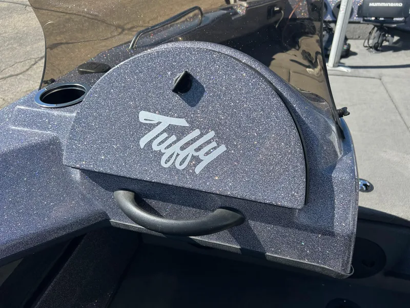 Slide: The Image of Tuffy 1760 Osprey 2014 boat dashboard with storage compartment and handle. - 22