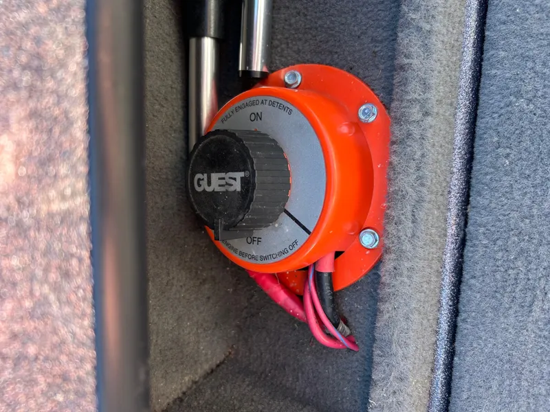 Slide: The Image of Battery switch in a 2014 Tuffy 1760 Osprey boat, labeled "Guest." - 31