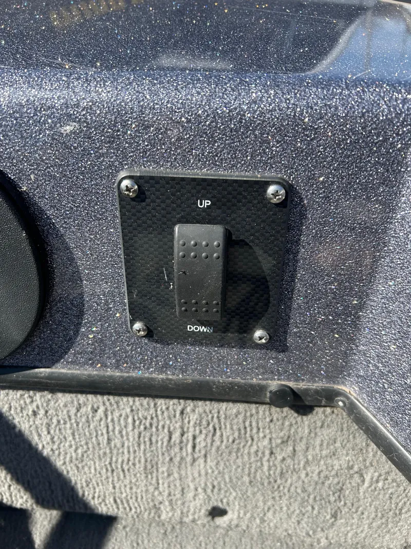 Slide: The Image of Switch panel on a 2014 Tuffy 1760 Osprey boat dashboard. - 40