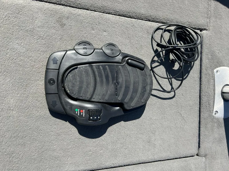 Slide: The Image of Foot pedal control on a 2014 Tuffy 1760 Osprey boat. - 48