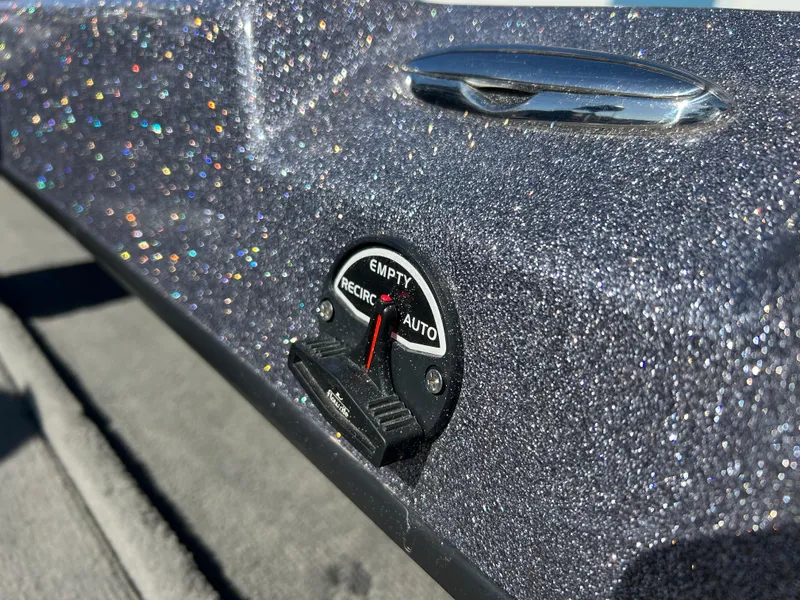 Slide: The Image of Control panel on a 2014 Tuffy 1760 Osprey boat with glittery finish. - 49