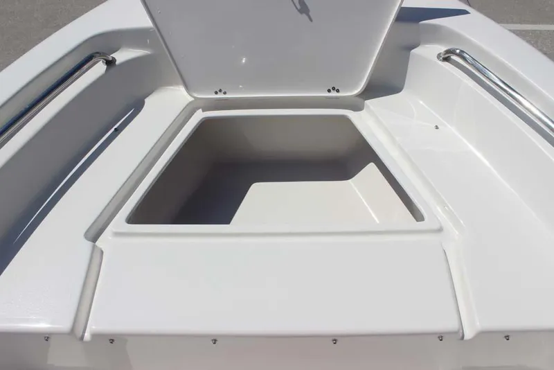 Slide: The Image of 2025 Key West 189 FS boat storage compartment with open lid, showcasing spacious interior. - 15