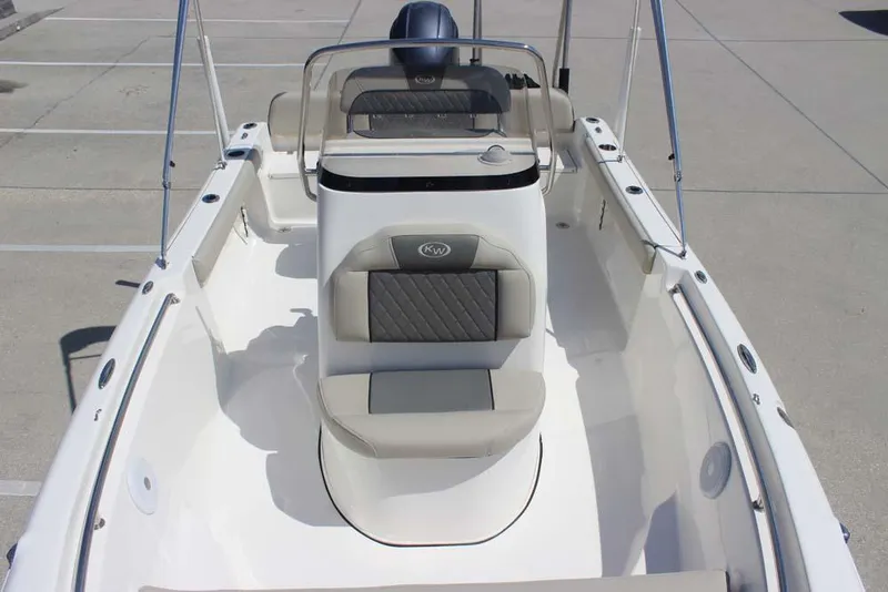 Slide: The Image of 2025 Key West 189 FS boat interior with seating and steering console. - 16