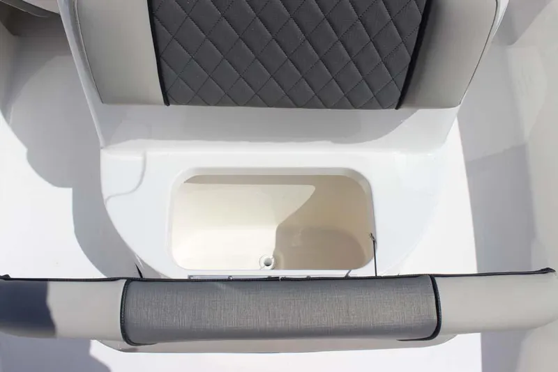 Slide: The Image of 2025 Key West 189 FS boat seat with storage compartment, featuring quilted upholstery. - 17