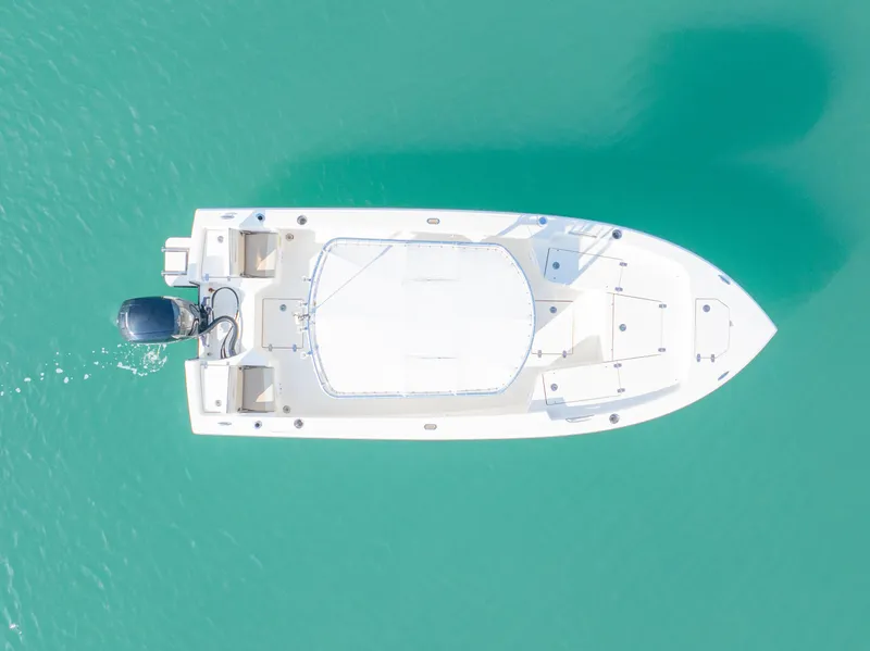 Slide: The Image of Aerial view of 2022 Pathfinder 2005 TRS boat on turquoise water. - 12