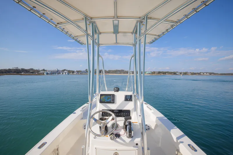 Slide: The Image of Center console view of 2022 Pathfinder 2005 TRS boat on calm water. - 17