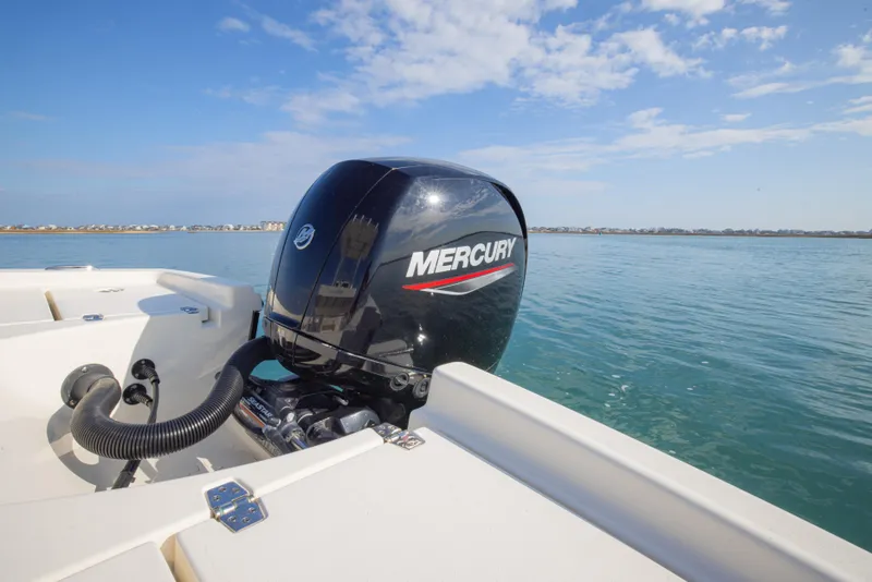 Slide: The Image of Pathfinder 2005 TRS boat with Mercury engine on calm water, 2022 model. - 23