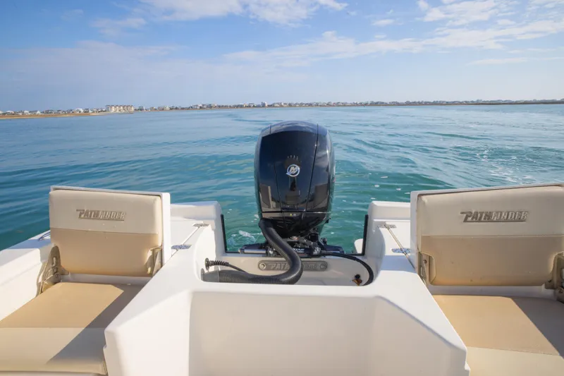 Slide: The Image of Pathfinder 2005 TRS boat on open water, rear view, 2022 model. - 29