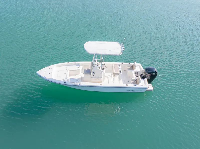 Slide: The Image of Aerial view of 2022 Pathfinder 2005 TRS boat on calm turquoise water. - 9