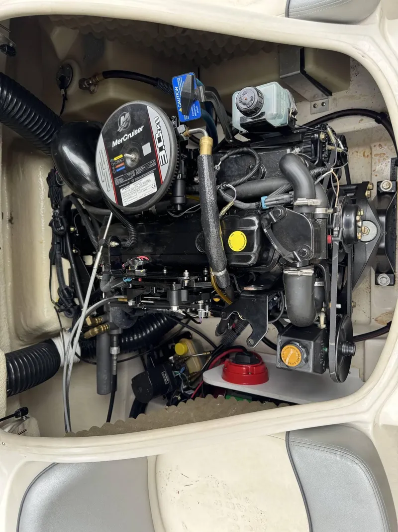 Slide: The Image of Engine compartment of a 2009 Sea Ray 175 Sport boat with MerCruiser 3.0L engine. - 10