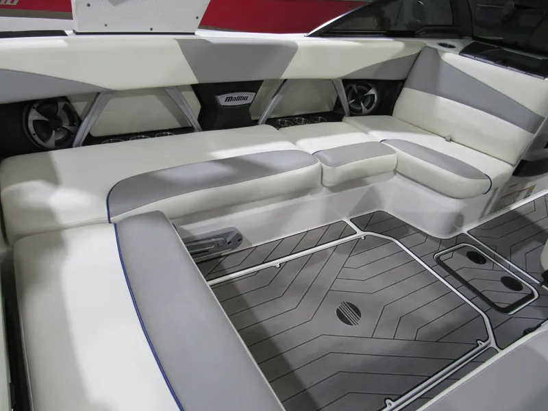 Slide: The Image of Interior of a 2017 Malibu 22 MXZ boat with sleek seating and modern design. - 5