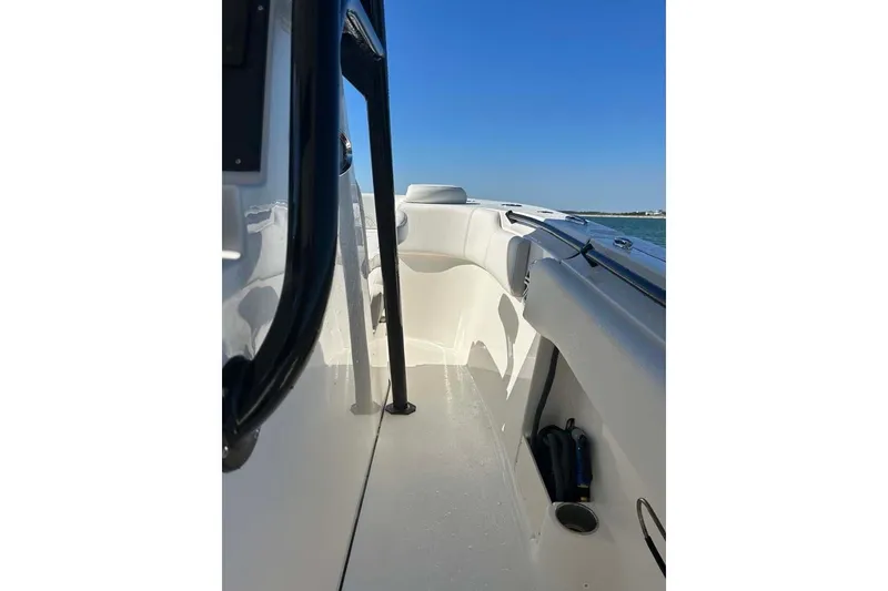 Slide: The Image of 2026 Key West 291 FS boat interior with sleek white design and ocean view. - 12