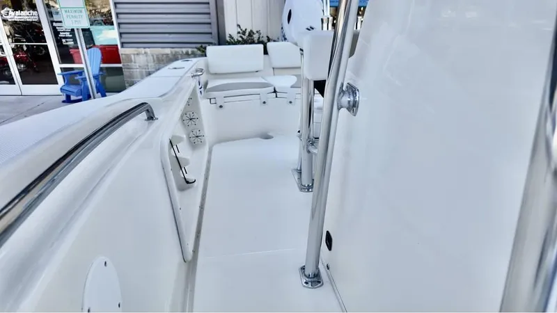 Slide: The Image of 2025 Bulls Bay 200CC boat interior with white seating and sleek design. - 16
