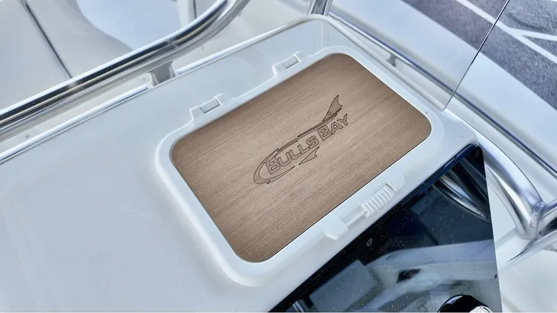 Slide: The Image of 2025 Bulls Bay 200CC boat console with branded compartment lid. - 20