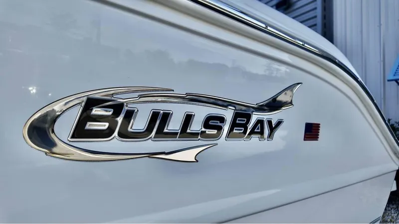 Slide: The Image of 2025 Bulls Bay 200CC boat logo on white hull. - 5
