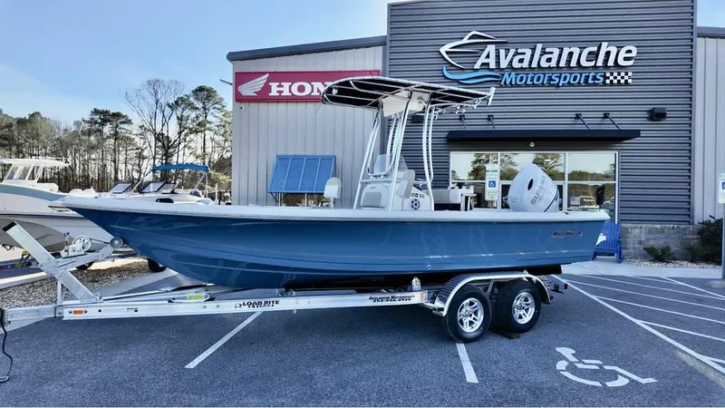 The Image of 2025 Bulls Bay 2200 XS boat on trailer at Avalanche Motorsports dealership. - 1