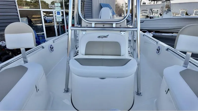 Slide: The Image of 2025 Bulls Bay 2200 XS boat interior with seating and console. - 7
