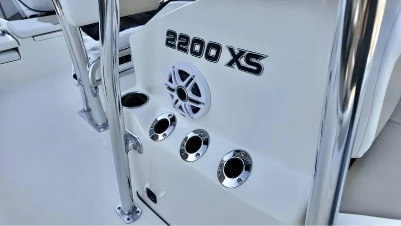 Slide: The Image of 2025 Bulls Bay 2200 XS boat interior with speaker and cup holders. - 8