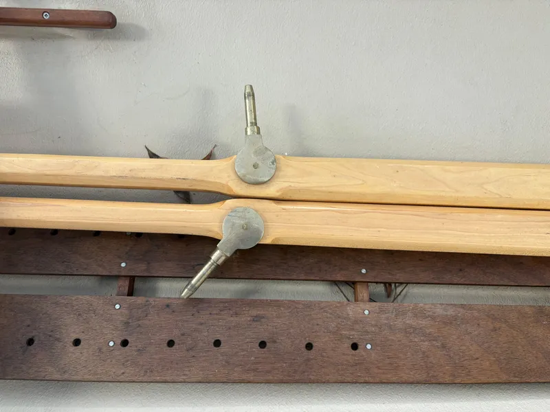 Slide: The Image of Wooden oars of a 2012 15-ft Adirondack Guideboat, displayed on a wall. - 10