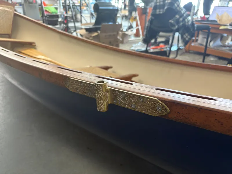 Slide: The Image of 15-ft Adirondack Guideboat, 2012 model, featuring detailed brass hardware and wooden interior. - 5