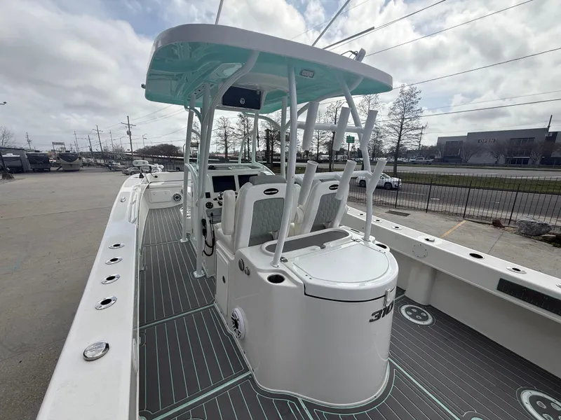 Slide: The Image of 2021 Twin Vee 310 GF boat with spacious deck and modern design. - 15