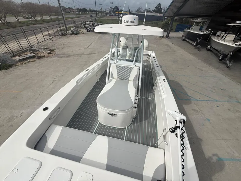 Slide: The Image of 2021 Twin Vee 310 GF boat with spacious deck and modern design. - 28