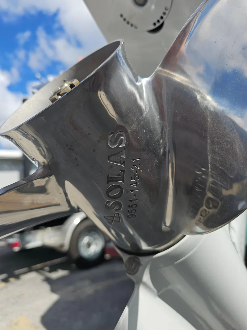 Slide: The Image of Close-up of a Solas propeller on a 2025 Savannah 210X boat. - 31