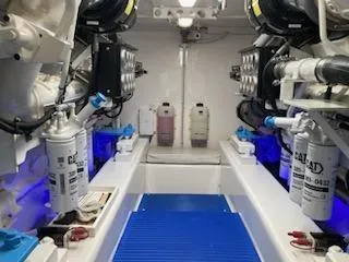 Slide: The Image of 2007 Bertram 570 Convertible yacht cruising on open water. - 9