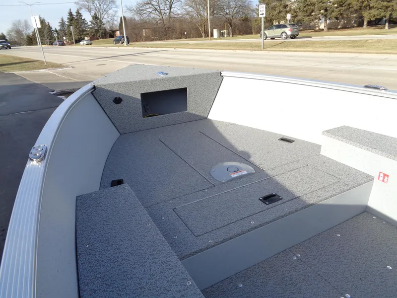 Slide: The Image of 2025 Lund 1600 Fury Heritage boat interior with spacious deck and storage compartments. - 8