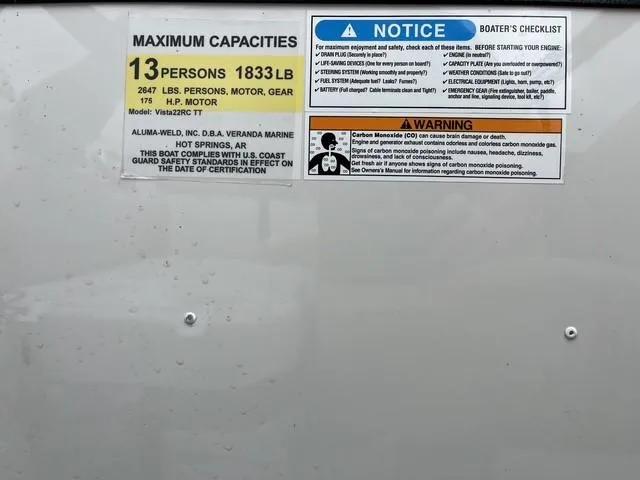 Slide: The Image of ```json
{
  "alt_text": "Capacity and safety notice on 2025 Veranda VISTA VIEW 22RC boat."
}
``` - 14