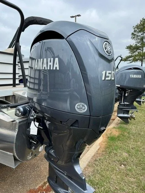 Slide: The Image of Yamaha 150 outboard motor on 2025 Veranda VISTA VIEW 22RC boat, parked outdoors. - 5