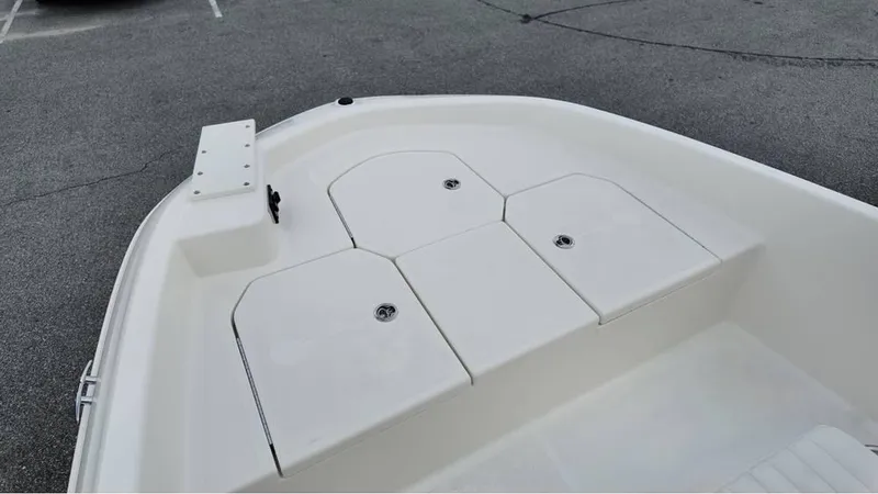Slide: The Image of 2025 Bayliner T18 Limited Edition boat deck with storage compartments. - 12