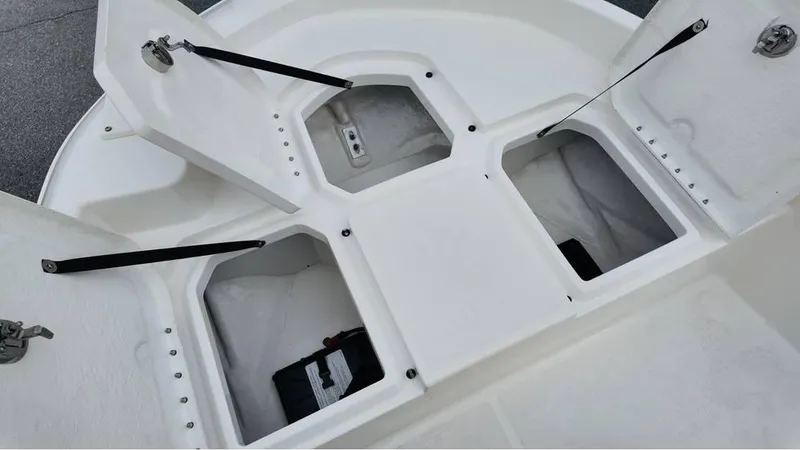 Slide: The Image of 2025 Bayliner T18 Limited Edition boat storage compartments open. - 20