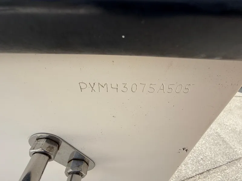 Slide: The Image of Hull identification number on 2005 Parker 2510 Deep Vee Walkaround boat. - 11