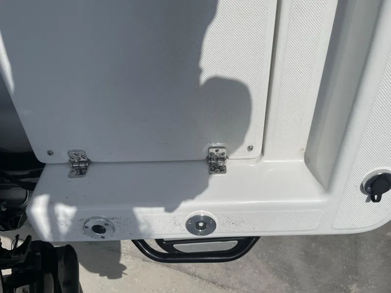 Slide: The Image of 2025 Savannah 210X boat deck detail with hinges and textured surface. - 18
