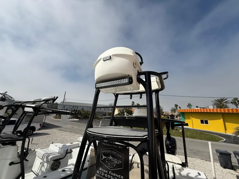 Slide: The Image of 2021 C-Hawk 25 Center Console boat with elevated helm and LED light bar. - 14