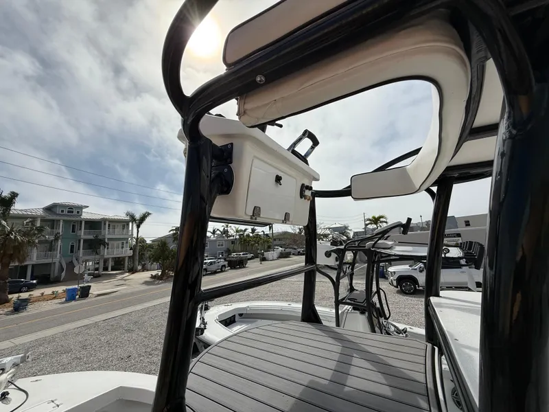 Slide: The Image of 2021 C-Hawk 25 Center Console boat with elevated seating and modern design. - 16