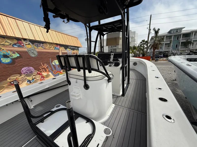 Slide: The Image of 2021 C-Hawk 25 Center Console boat with sleek deck and modern console design. - 7
