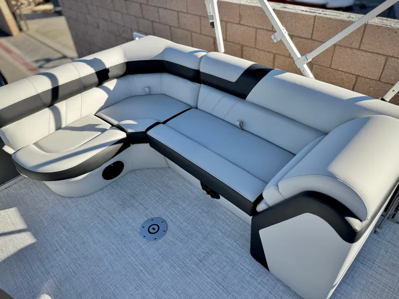Slide: The Image of 2025 Berkshire 20 CRSE boat interior with sleek, modern seating and stylish design. - 11