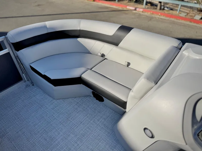Slide: The Image of 2025 Berkshire 20 CRSE boat interior with sleek, modern seating design. - 13