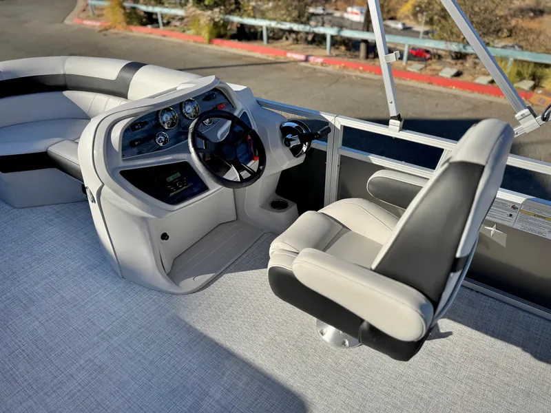 Slide: The Image of 2025 Berkshire 20 CRSE boat interior with modern helm and comfortable seating. - 14