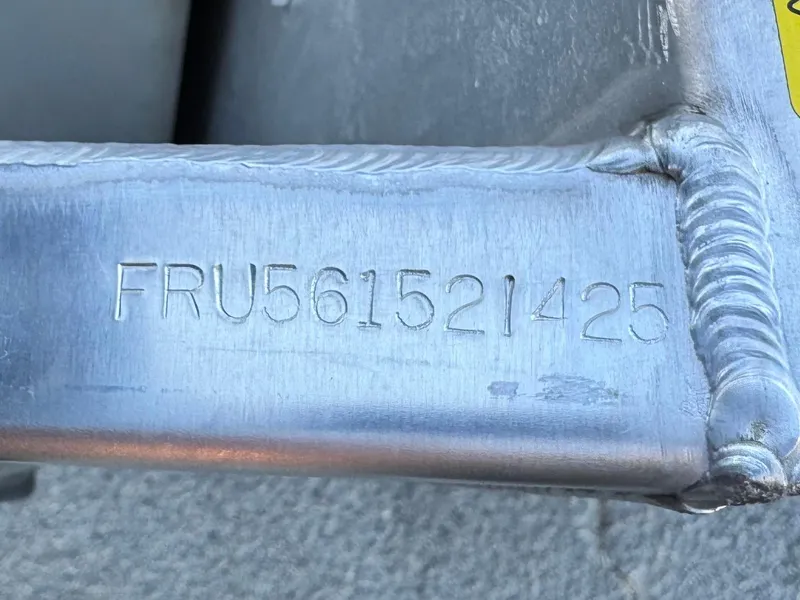 Slide: The Image of Close-up of a serial number FRU561521425 on a 2025 Berkshire 20 CRSE metal frame. - 21