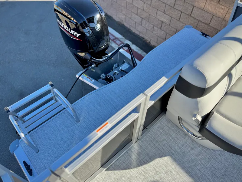 Slide: The Image of 2025 Berkshire 20 CRSE boat with Mercury engine and seating area. - 9