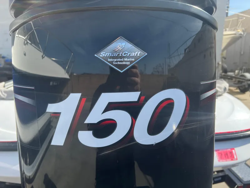 Slide: The Image of Close-up of a 2005 Nitro NX 882 DC boat engine with SmartCraft technology, showing "150" label. - 17