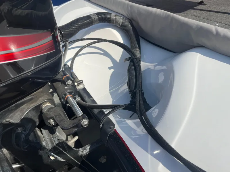 Slide: The Image of Close-up of a 2005 Nitro NX 882 DC boat engine area. - 24