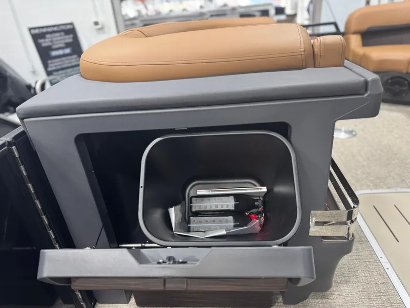 Slide: The Image of Luxurious seating in 2025 Bennington 24 MFB boat with tan leather and cup holders. - 18