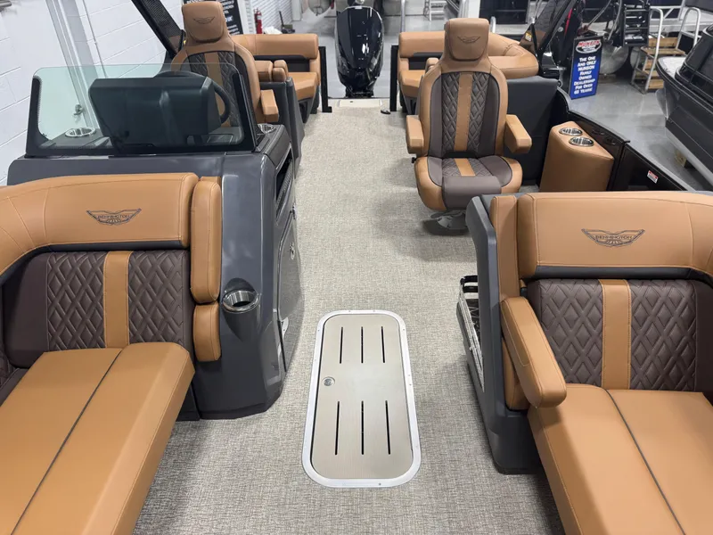 Slide: The Image of Luxurious interior of 2025 Bennington 24 MFB pontoon boat with tan leather seating. - 5