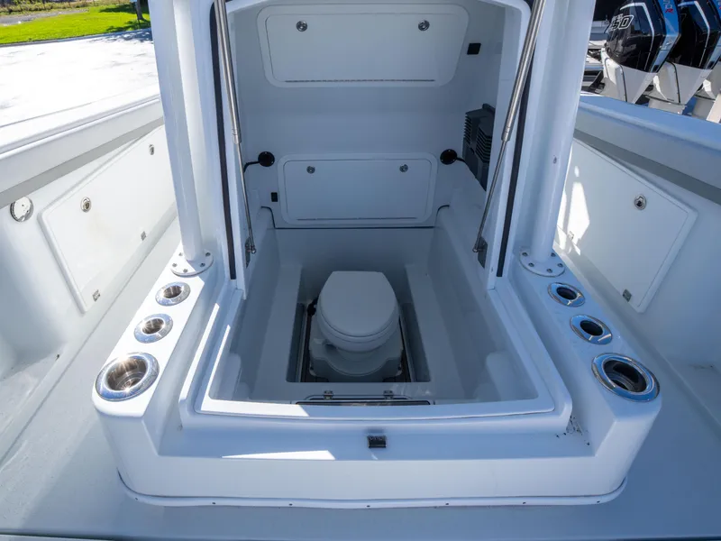 Slide: The Image of 2023 Yellowfin 36 Center Console boat with integrated marine toilet and storage compartments. - 17