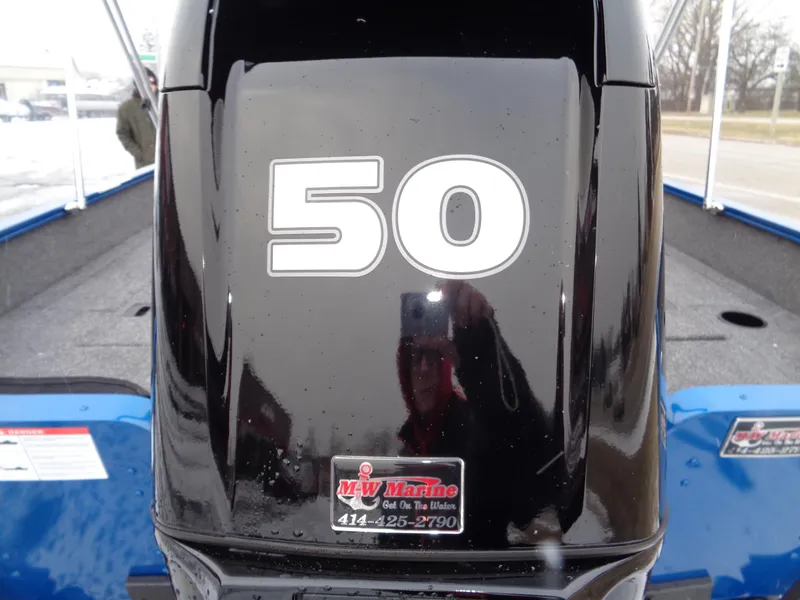 Slide: The Image of 2024 Lund 1650 Angler Tiller boat with a 50 HP engine, displayed at M-W Marine. - 6