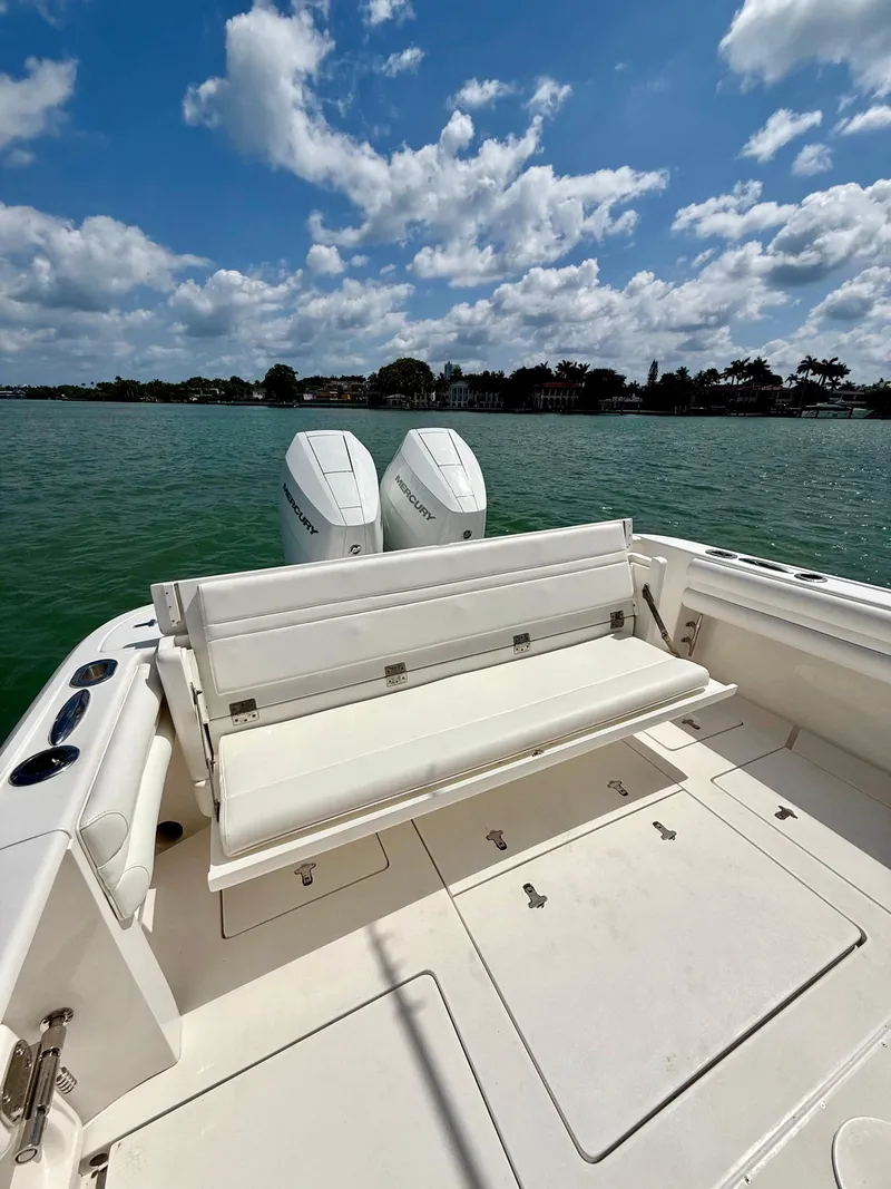Slide: The Image of 2015 Intrepid 375 Center Console boat with dual engines on a sunny day. - 15
